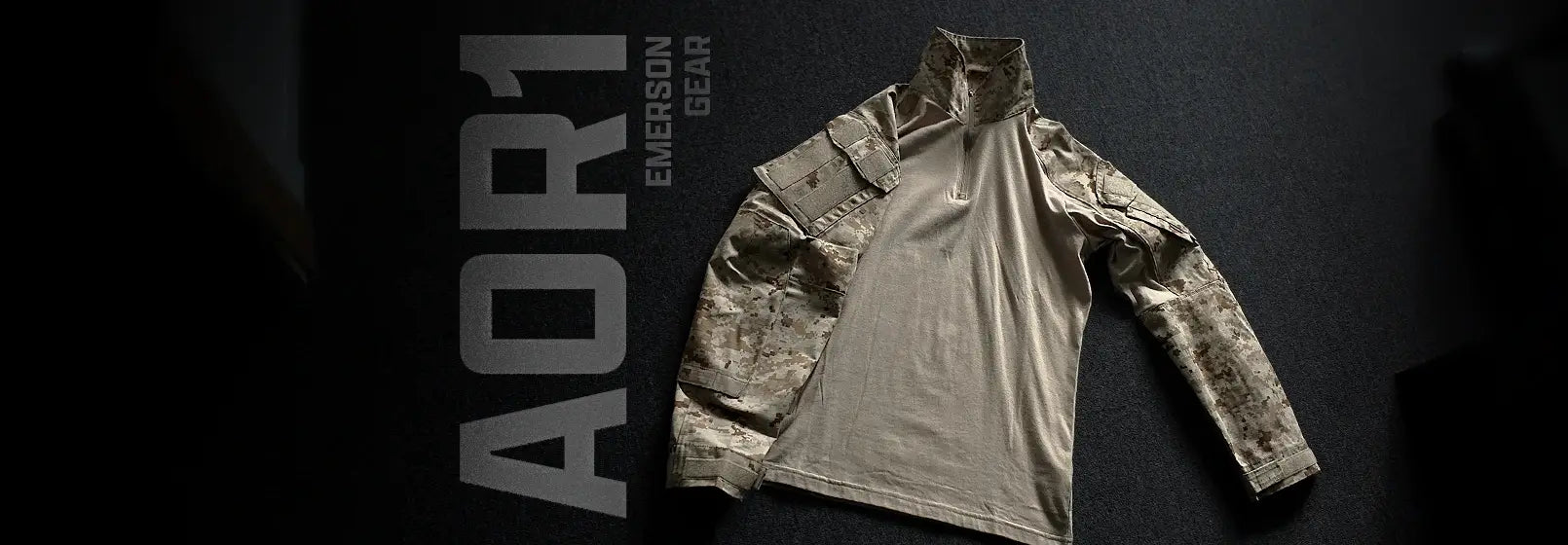 An Emerson Gear G3 Tactical Top in AOR1 Camouflage on a dark floor with text displaying 'AOR1 EMERSON GEAR'